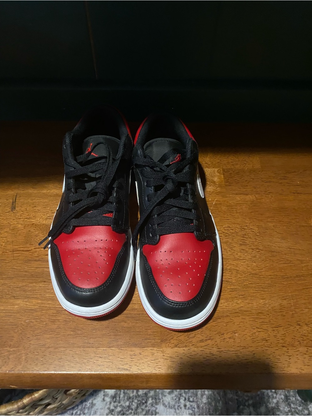 Jordan Red and Black Low Top Sneaker Pair